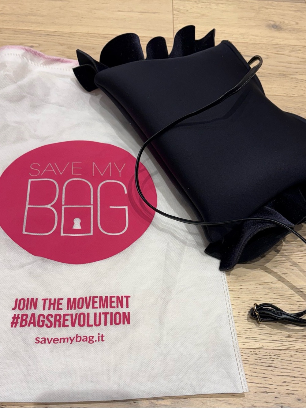 Save My Bag Ruffled Crossbody or shoulder or clutch bag made out of neoprene.